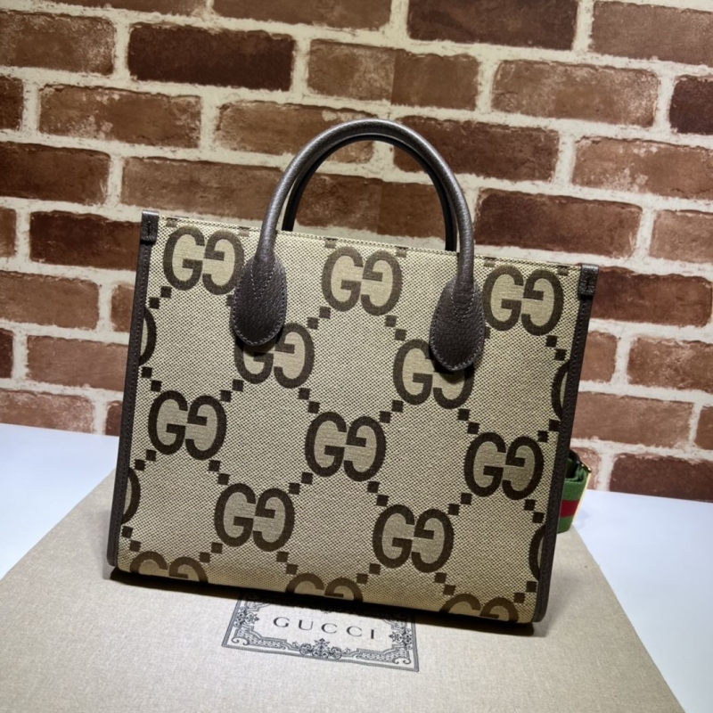 G*u*i shopping bags